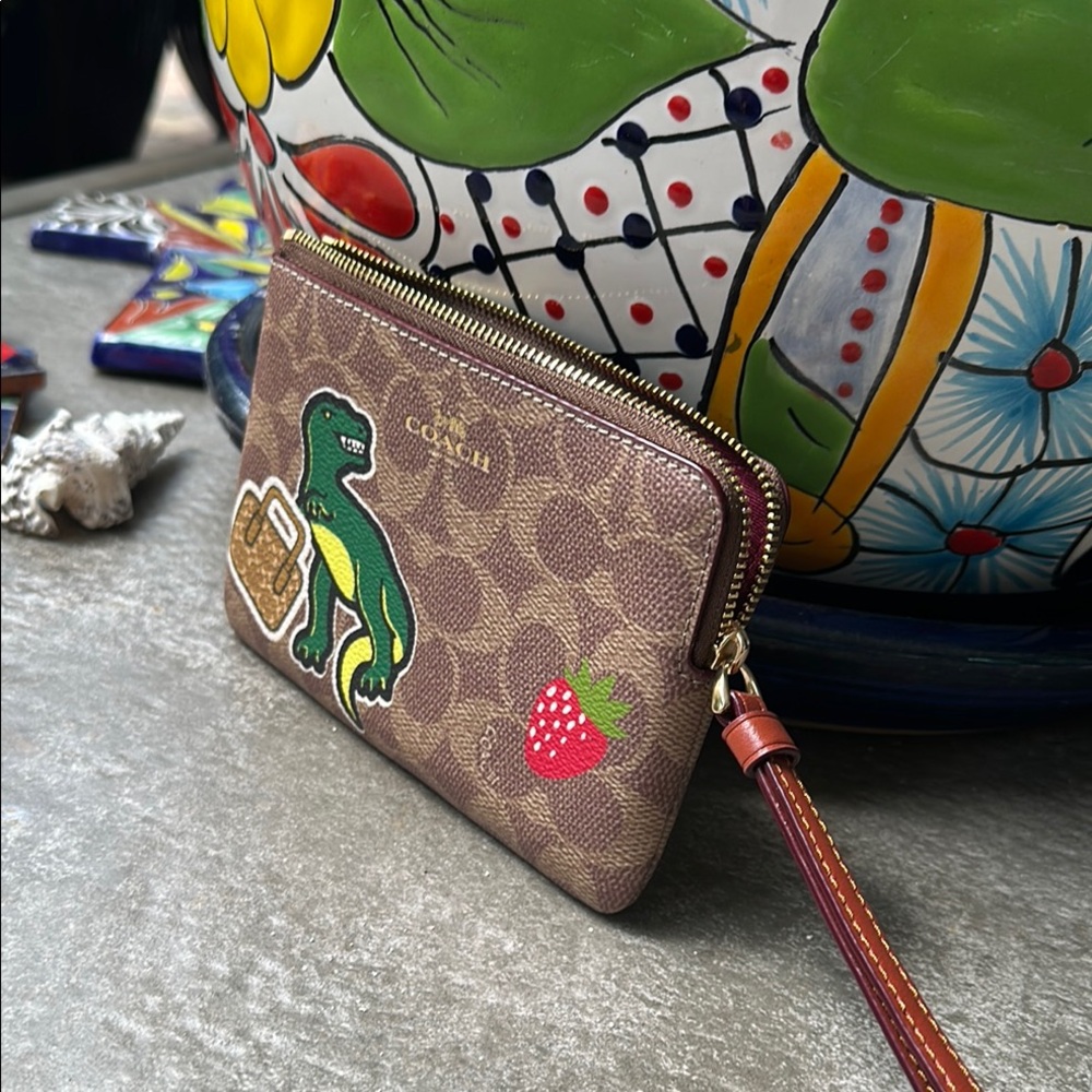 Coach Brown Wristlet with Dinosaur and Strawberry Patches - Picture 4 of 13